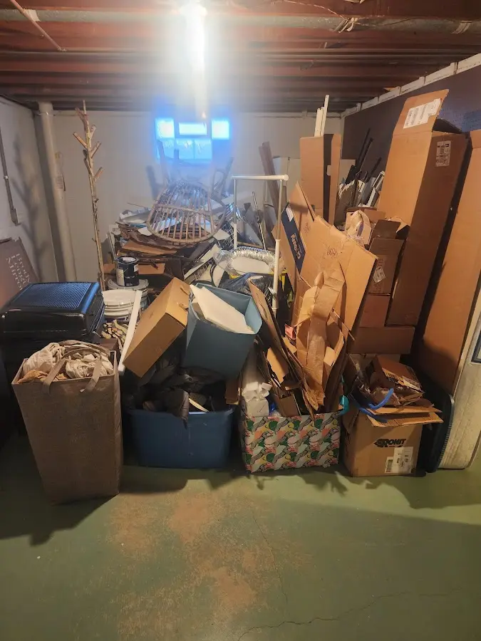 Roll-off dumpster container at job site for 15 Yard Dumpster Rental in Fort Lupton